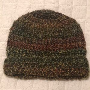 Handmade Crochet hat. Never worn. Multiple browns and greens in color.